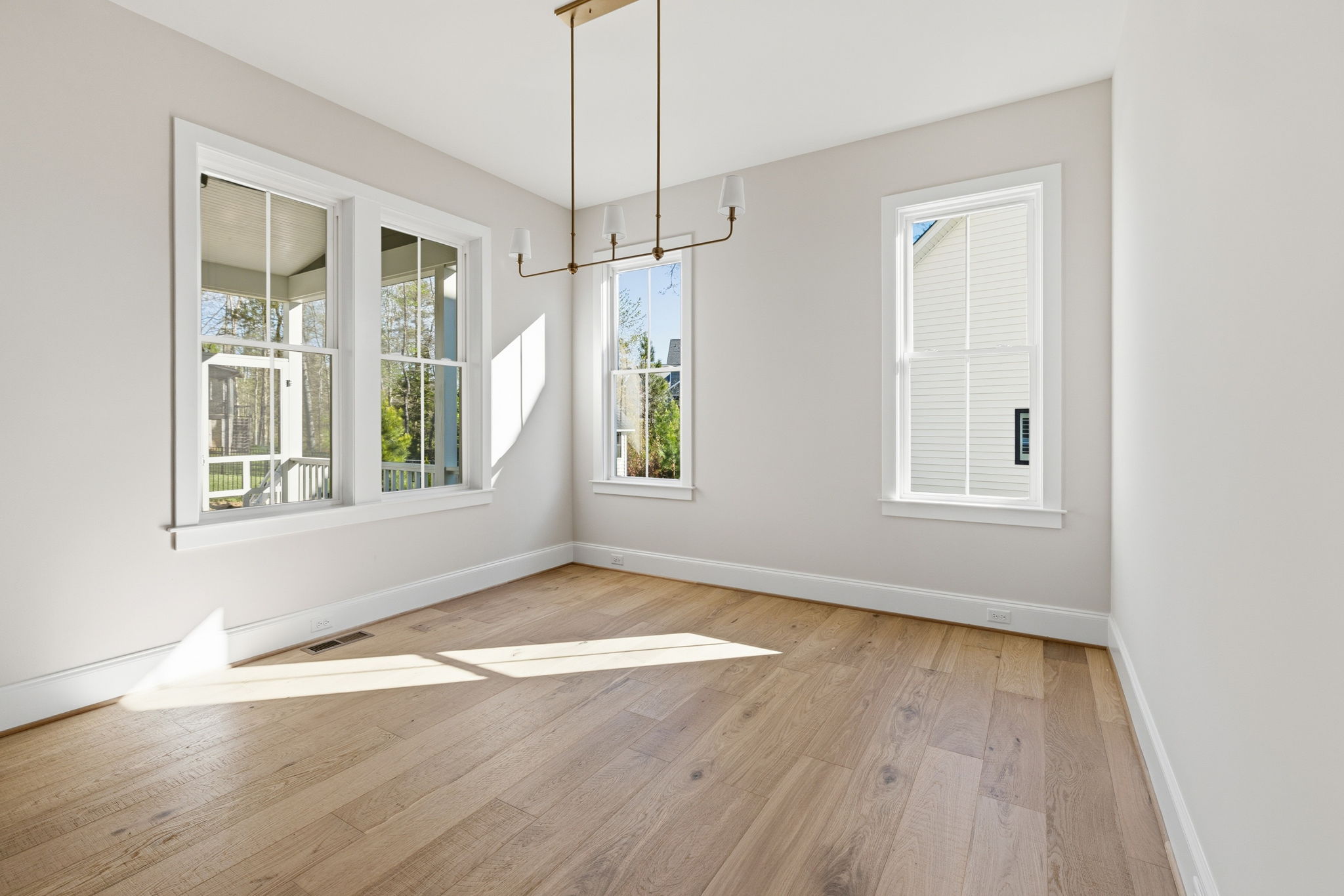 dining room with four windows