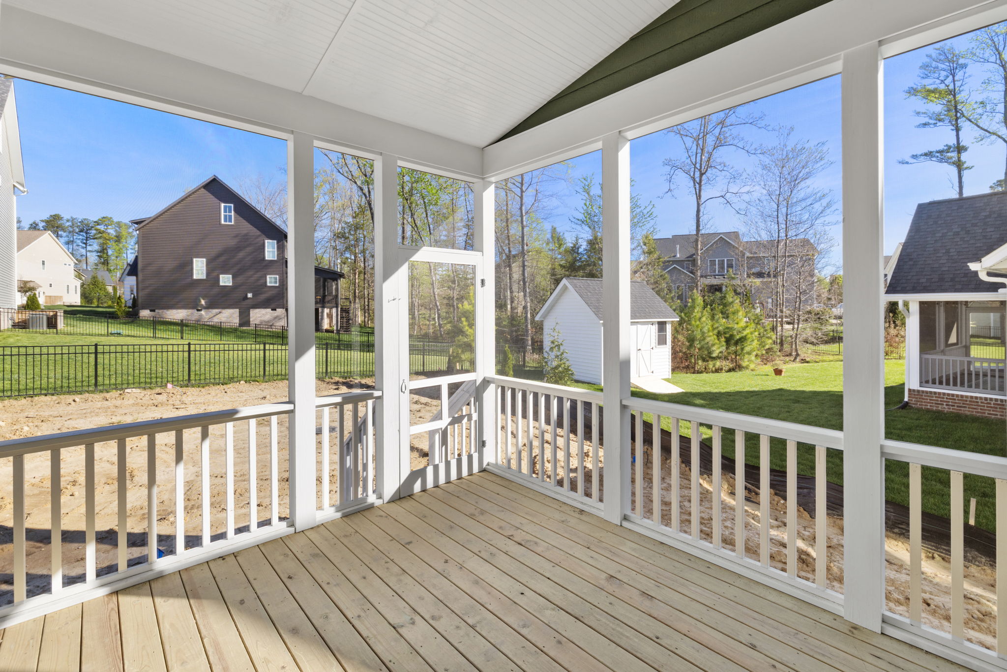 screened in porch overlooking yard
