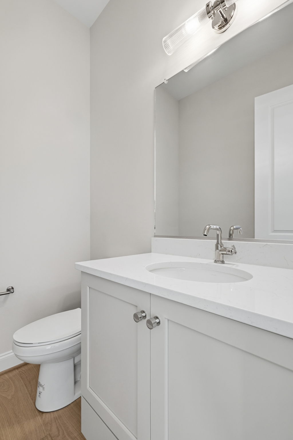 pristine toilet and sink in half bath